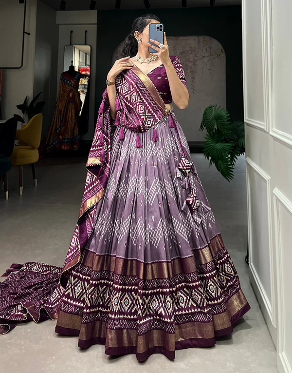 Designer premium multi color function wear dot & ikkat print with foil work tussar silk lehenga choli.