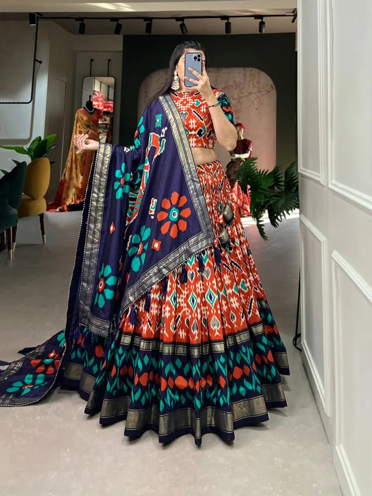 Lehenga Choli For Womens And Girls Tussar Silk Fabric With Orange Color Patola Print With Foil work Speciel Events Chaniya Choli Set.
