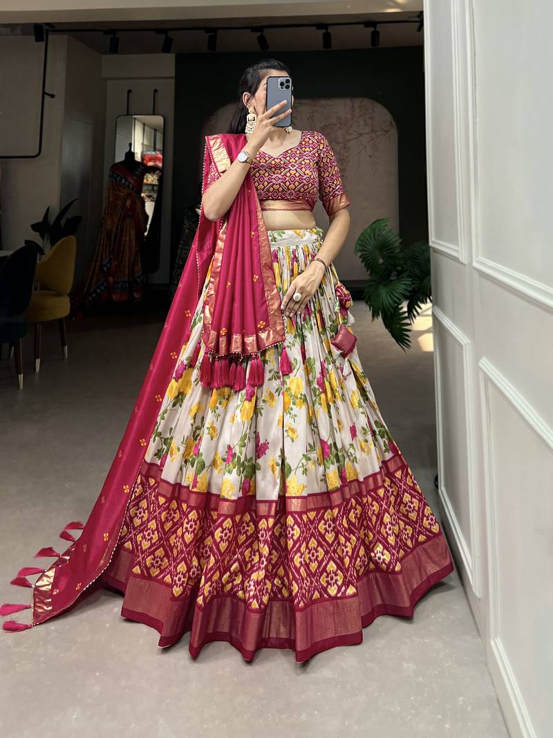 Designer premium multi color function wear floral and patola print with foil work tussar silk lehenga choli.