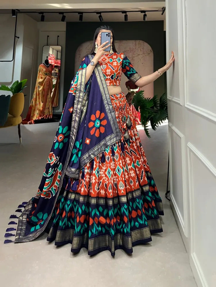 Lehenga Choli For Womens And Girls Tussar Silk Fabric With Orange Color Patola Print With Foil work Speciel Events Chaniya Choli Set.