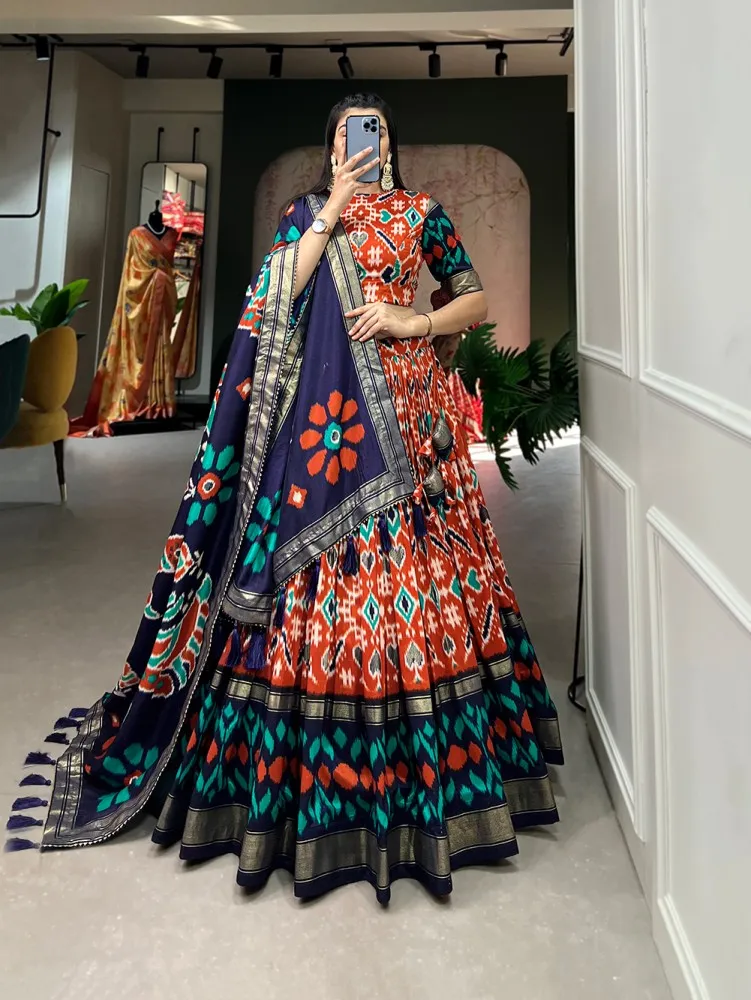 Lehenga Choli For Womens And Girls Tussar Silk Fabric With Orange Color Patola Print With Foil work Speciel Events Chaniya Choli Set.