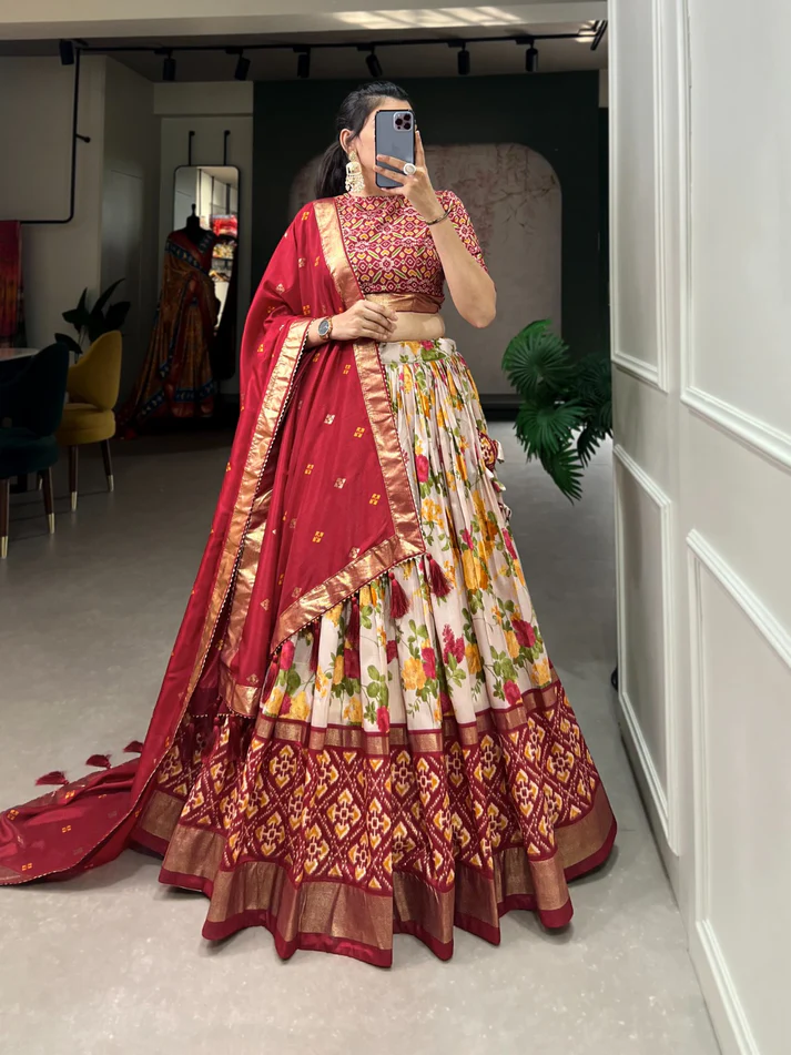 Designer premium multi color function wear floral and patola print with foil work tussar silk lehenga choli.