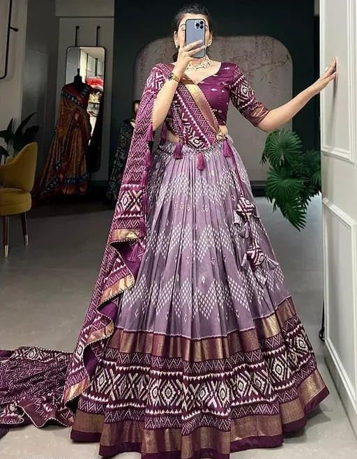 Designer premium multi color function wear dot & ikkat print with foil work tussar silk lehenga choli.
