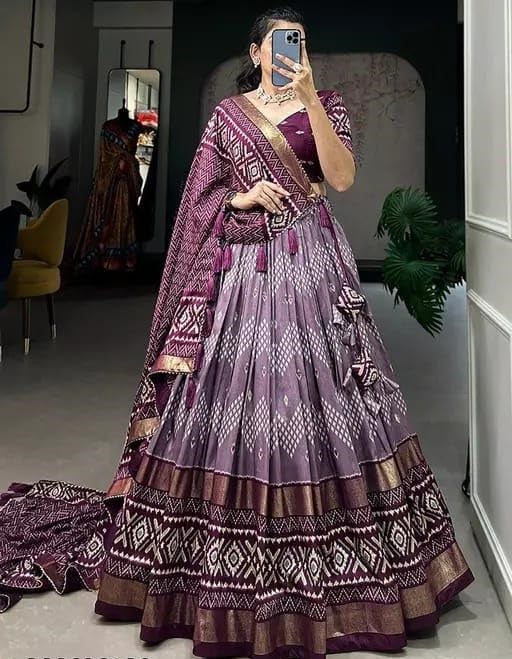 Designer premium multi color function wear dot & ikkat print with foil work tussar silk lehenga choli.