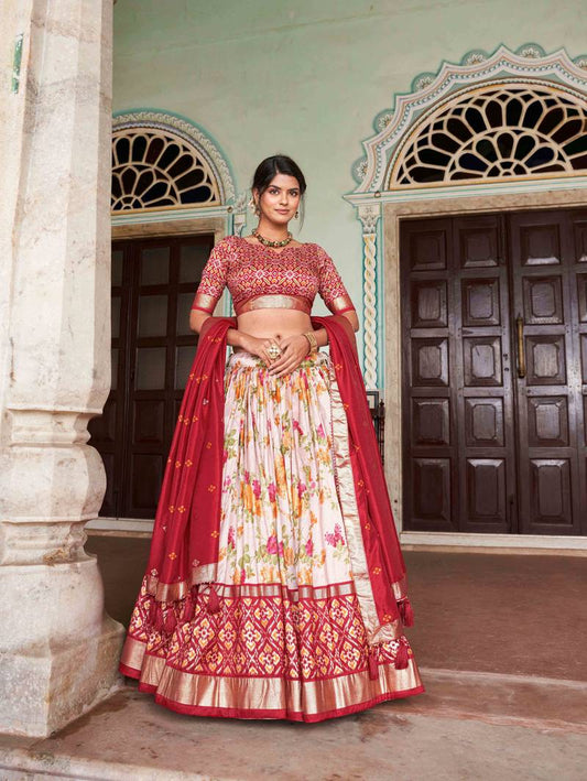 Fascinating White & Red Patola Printed Tussar Silk Lehenga Choli.