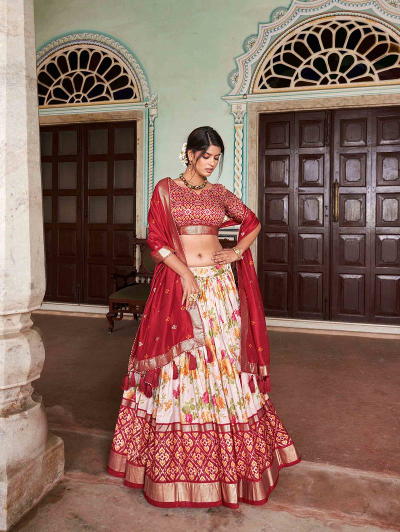 Fascinating White & Red Patola Printed Tussar Silk Lehenga Choli.