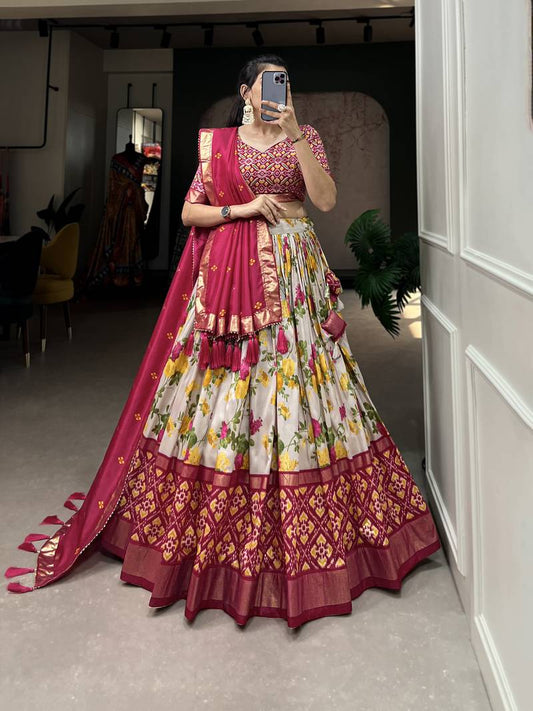 Designer premium multi color function wear floral and patola print with foil work tussar silk lehenga choli.