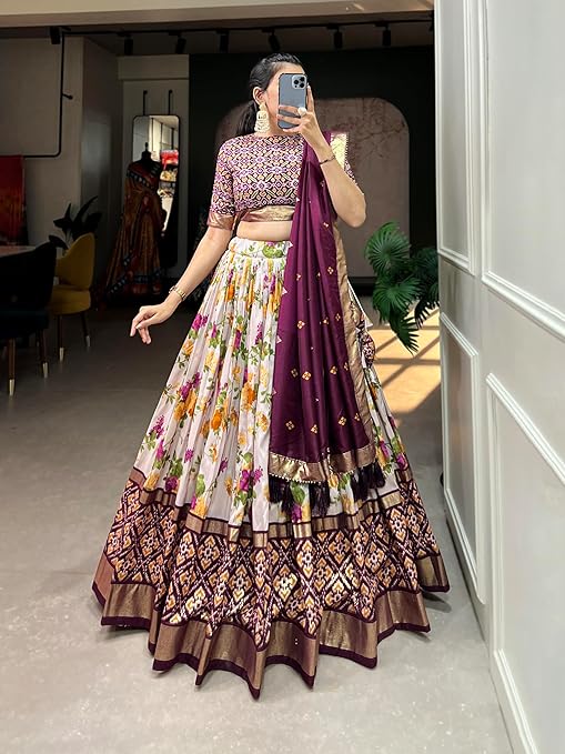 Wine Color Floral And Patola Printed With Foil Work Tussar Silk Wedding Lehenga Choli.