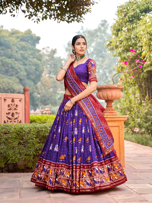 Purple Tussar Silk Lehenga Choli with Enchanting Ikat Patola Print and Foil Work.