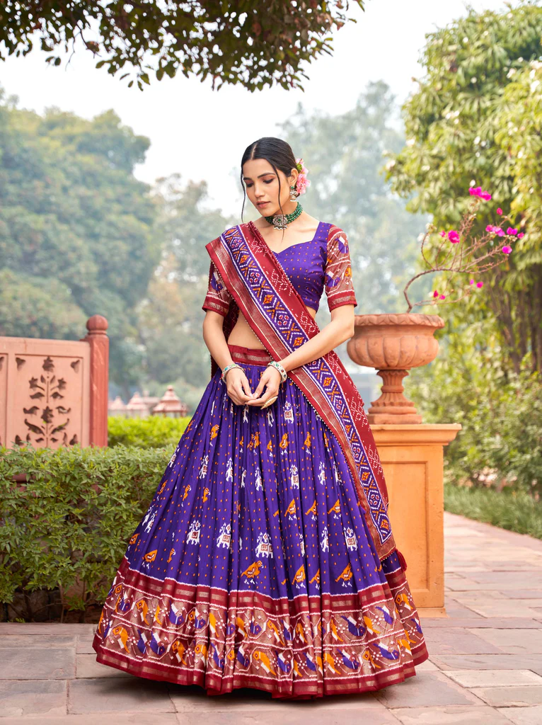 Purple Tussar Silk Lehenga Choli with Enchanting Ikat Patola Print and Foil Work.