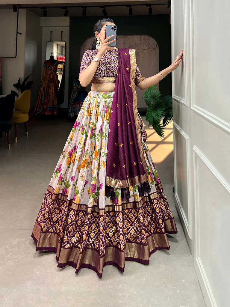 Wine Color Floral And Patola Printed With Foil Work Tussar Silk Wedding Lehenga Choli.
