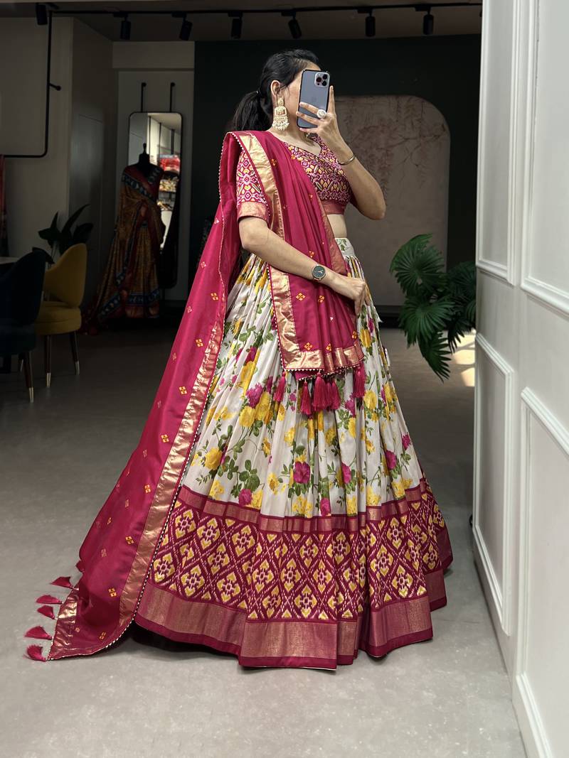 Designer premium multi color function wear floral and patola print with foil work tussar silk lehenga choli.