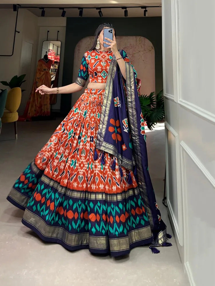 Lehenga Choli For Womens And Girls Tussar Silk Fabric With Orange Color Patola Print With Foil work Speciel Events Chaniya Choli Set.