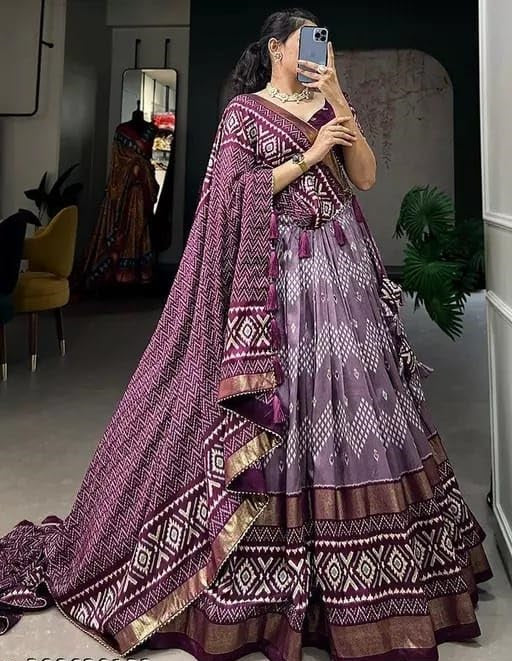 Designer premium multi color function wear dot & ikkat print with foil work tussar silk lehenga choli.