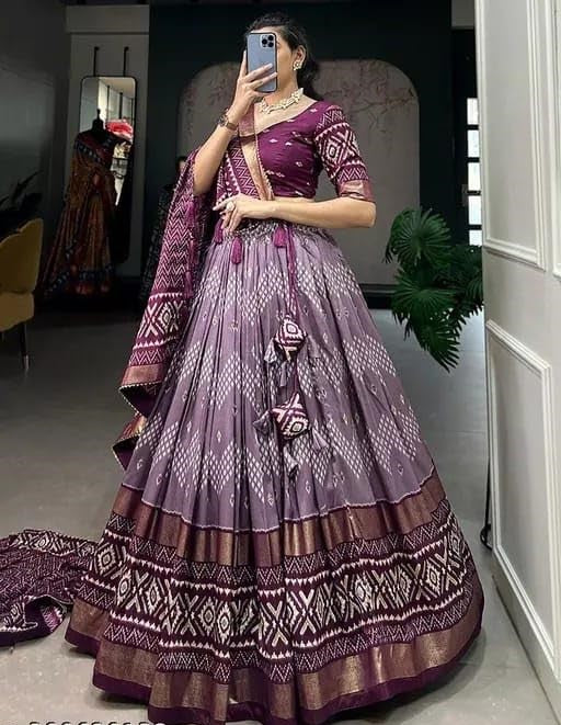 Designer premium multi color function wear dot & ikkat print with foil work tussar silk lehenga choli.